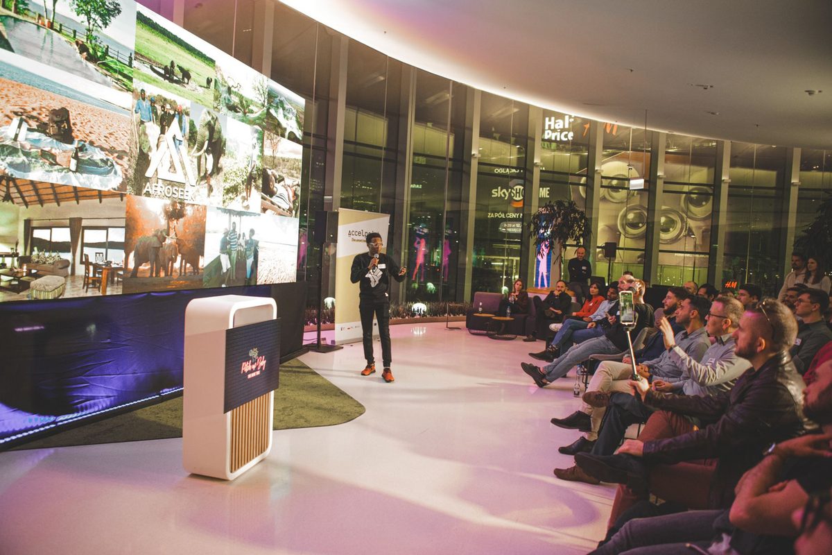 Afroseek being pitched on stage to an audience of investors